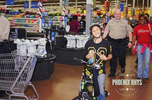 kid-on-bike-blue-santa-prp